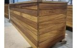 Steel planters with decorative timber cladding