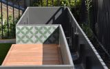 Bespoke steel planter / bench clad with terrazzo tiles