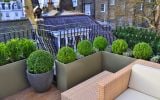 Planters are often commissioned to edge a terrace or balcony