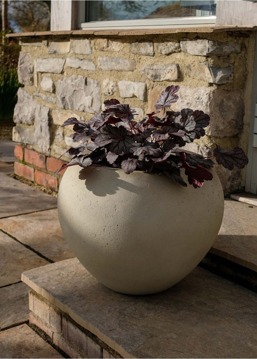 Light stone coloured outdoor planter