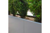 Visually seamless planting for office development public planters