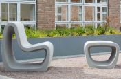 Outside courtyard with garden furniture and blue grey planter