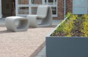 Powder coated steel planter with designer garden furniture