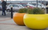 Brightly coloured composite planters 