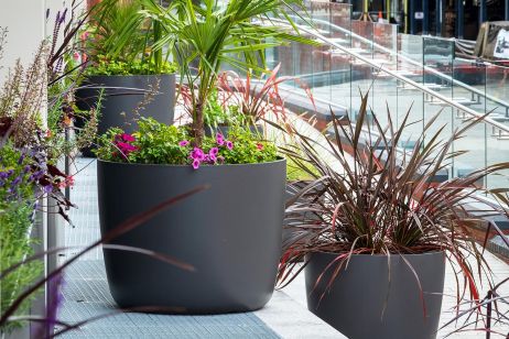 Large boulevard planters for retail development