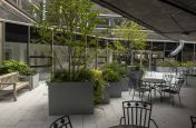 Steel planters for outdoor dining areas