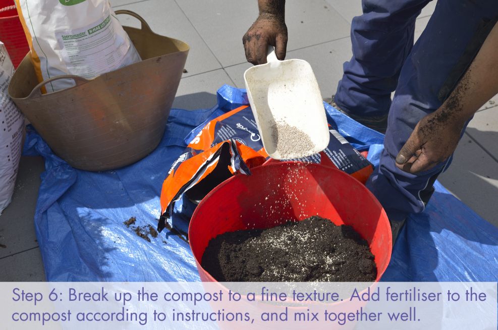 Add fertiliser to the compost and mix well