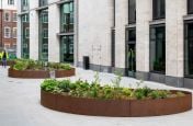 Large diameter open perimeter planters