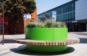 Bold coloured street planter with seating