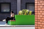 Metal street planters in vibrant green