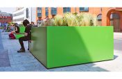 Colourful metal planters in public realm
