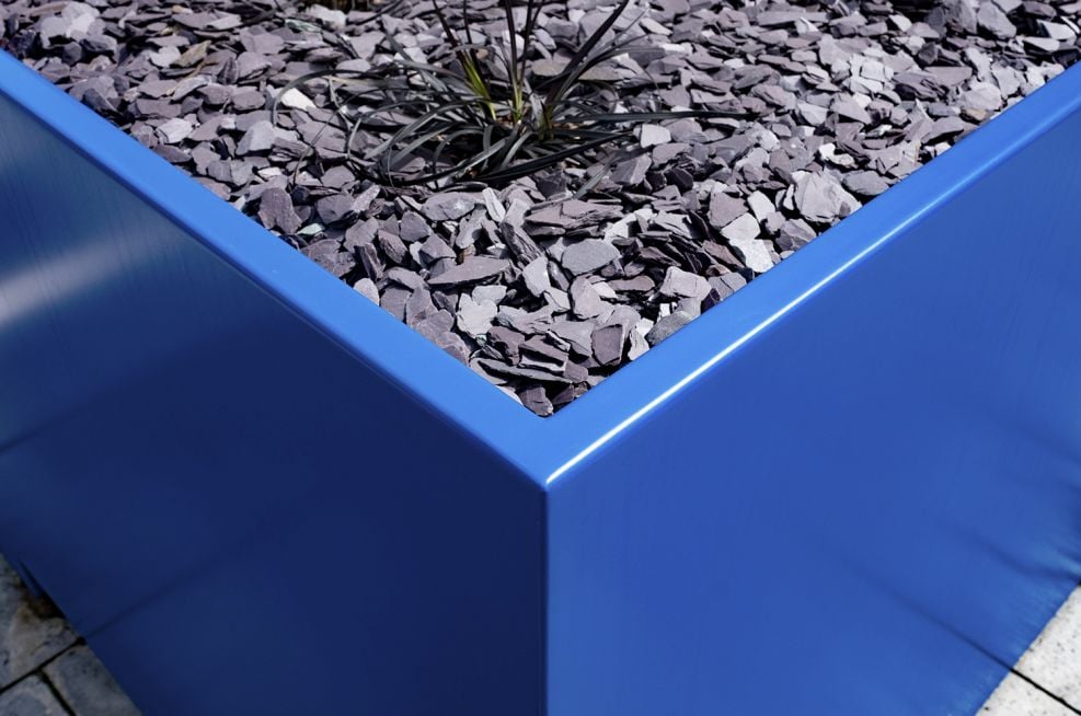 Coloured metal plant containers
