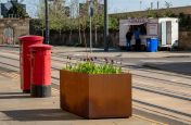Corten steel street planters for shrubs