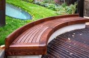 Curved timber garden bench