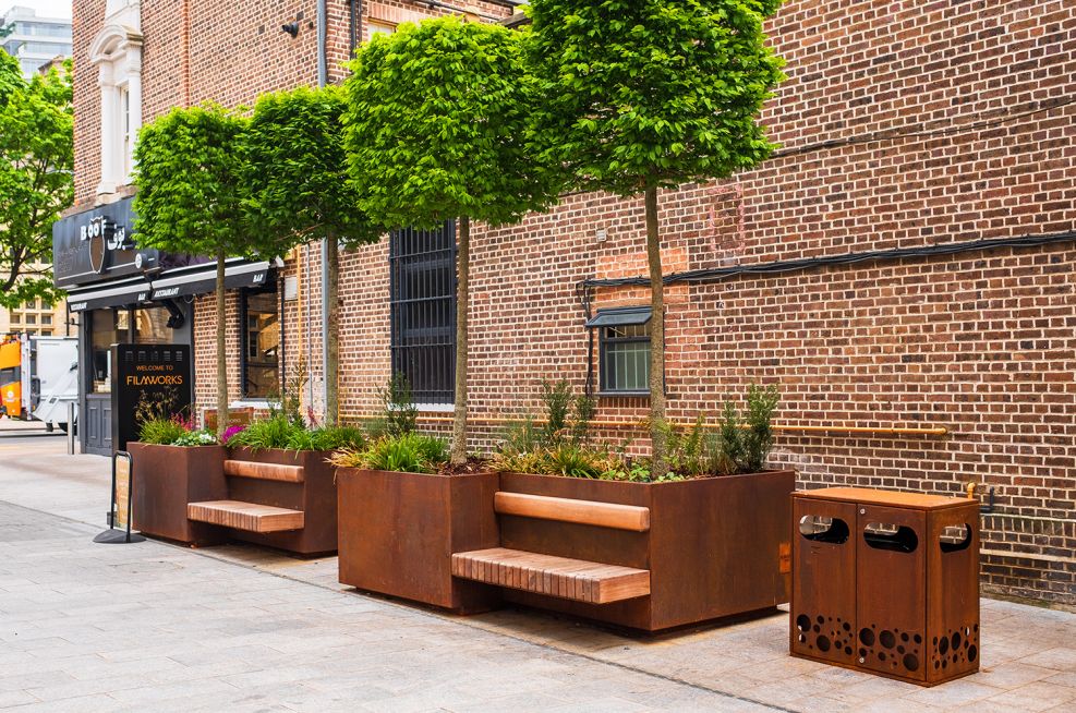 Corten steel tree planters with seating