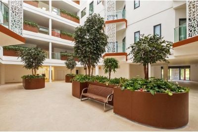 Large bespoke steel planters for atrium