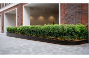 Metal planter for gradual slope