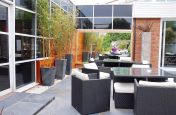 Granite Planters Along The Sandstone Paving