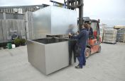 Planter Liner Being Lowered Into Steel Planters