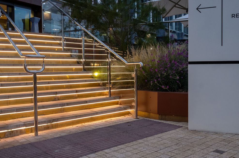 Custom brass clad illuminated stair risers