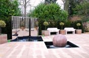 Bespoke Planters In Coloured Granite At Minimalist Water Garden