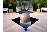 Water Feature With Our Custom Planters Behind
