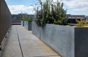 Zinc-clad steel planters for communal terrace