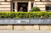 Lead planter with bespoke signage for commercial buildings