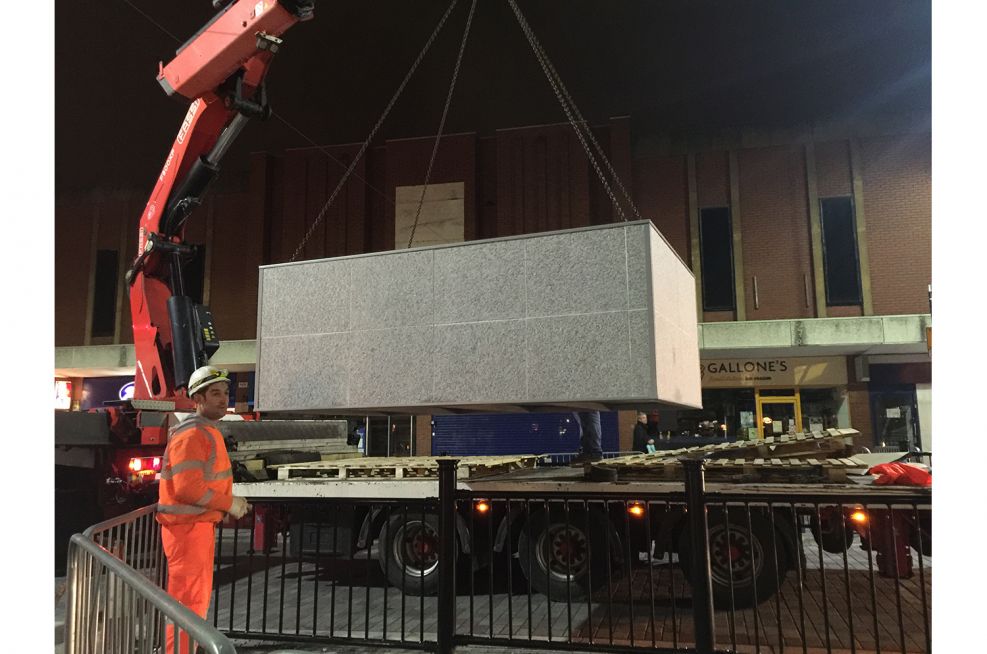 Large Granite Planters Being Lifted Into Place