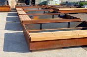 Bench seating weathered corten planter