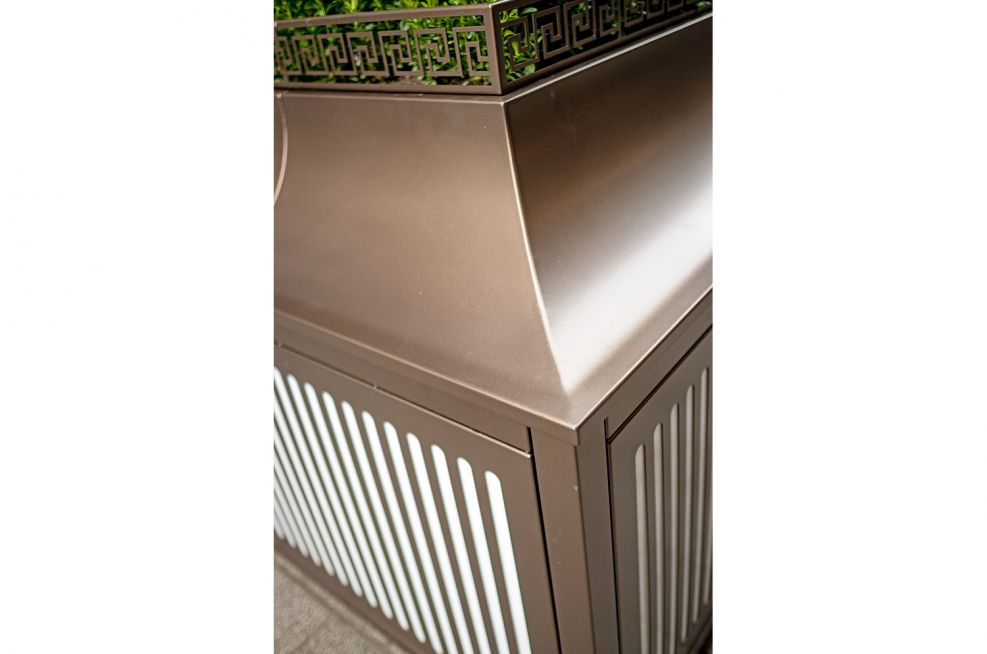 Steel planter with curved top scroll detail
