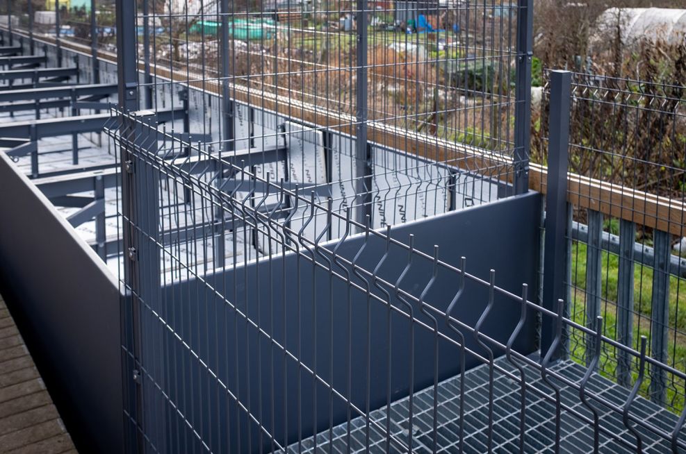 Planters with integrated security fencing