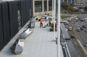 IOTA Staff Installing The Stainless Steel Planter