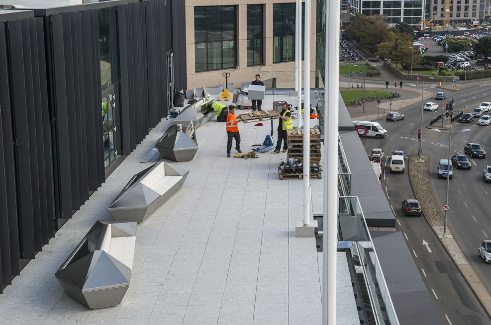 IOTA Staff Installing The Stainless Steel Planter