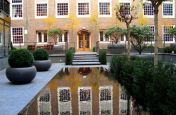 Large Aladin Planters In Courtyard