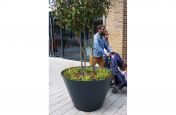 Rimless steel planters for public spaces