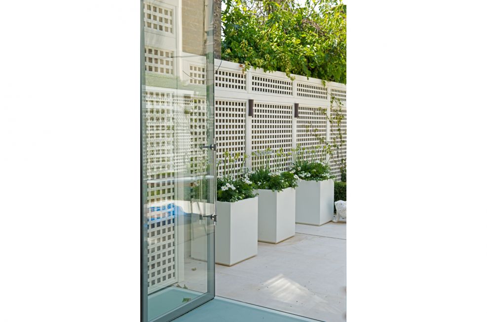 White Steel Powder Coated Planters In Courtyard