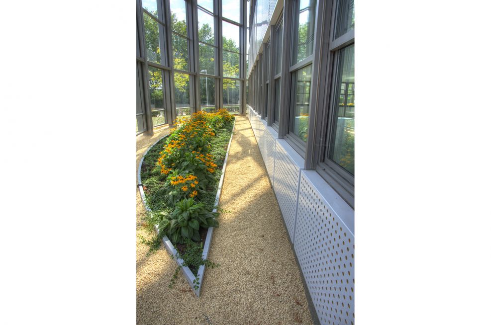 Steel Planters Around The Interior Of Building