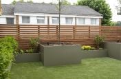 Matching tree planters and garden trough planters