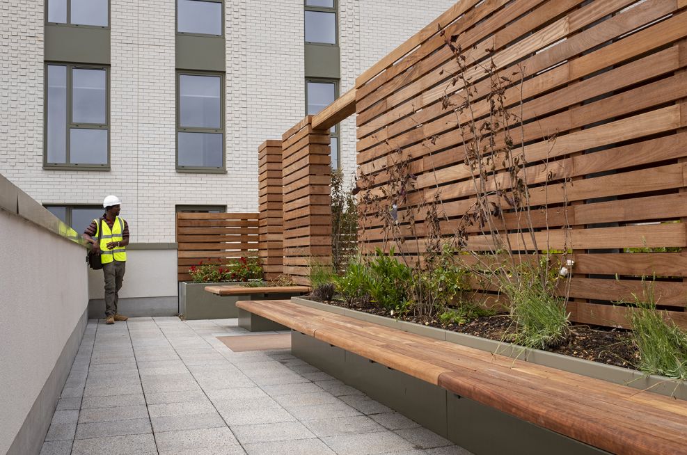 Planters with wooden privacy partitions