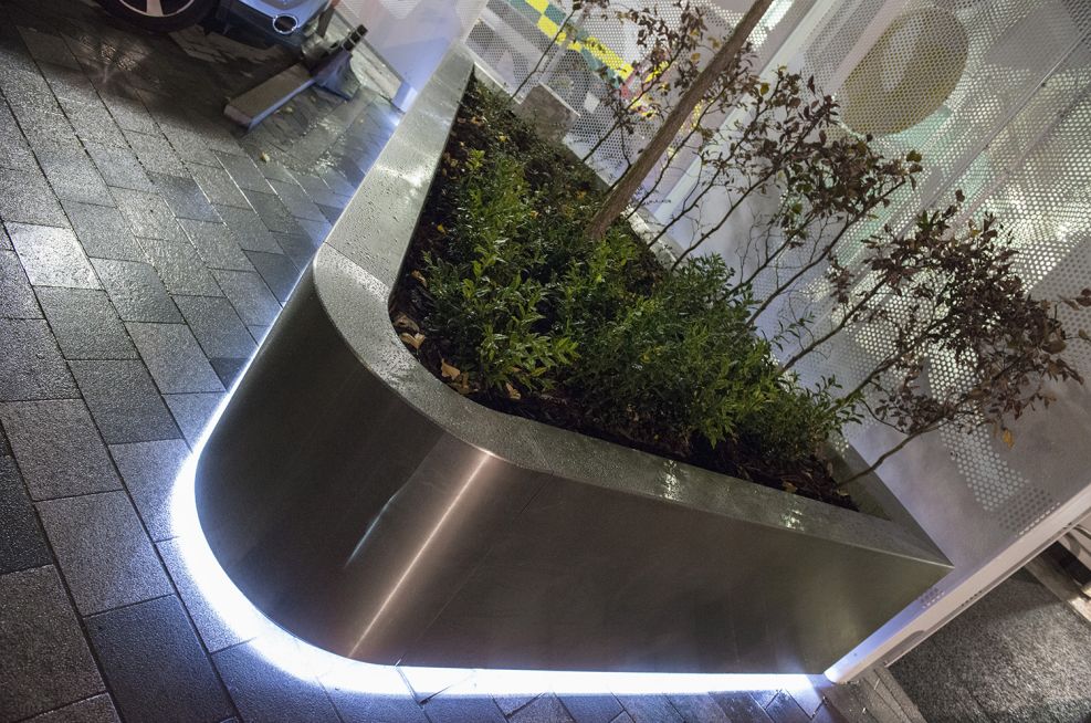 Bespoke stainless steel tree planters at University College Hospital [UCH]