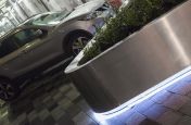 Bespoke stainless steel tree planters at University College Hospital [UCH]