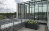 DELTA Custom planters at University of Greenwich: L 1600 x W 1600 x H 700mm, in RAL 7016 [Anthracite grey]