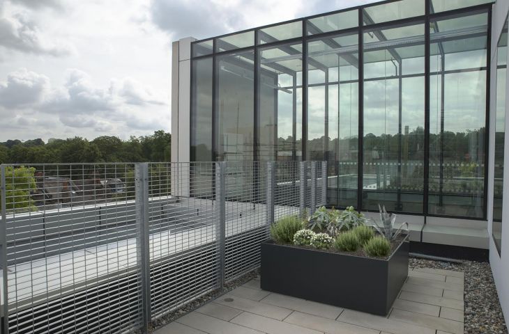 DELTA Custom planters at University of Greenwich: L 1600 x W 1600 x H 700mm, in RAL 7016 [Anthracite grey]