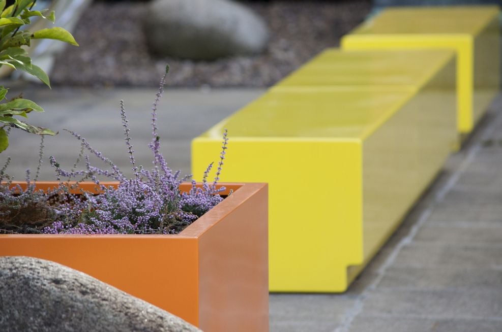 Planters With Bespoke Fibreglass Seating In RAL 1018 Zinc Yellow