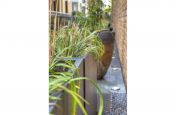 Steel Trough Planters Overlooking Apartments