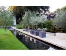 Granite Cube 600 planters next to a water rill at a private residence