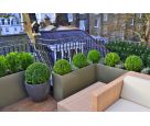Bespoke powder coated steel planters at Hans Place