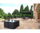 Granite Tall Taper XXL planters on an outdoor dining terrace