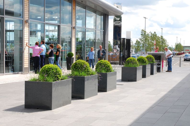 IOTA's Granite planters at The Outlet designer shopping mall